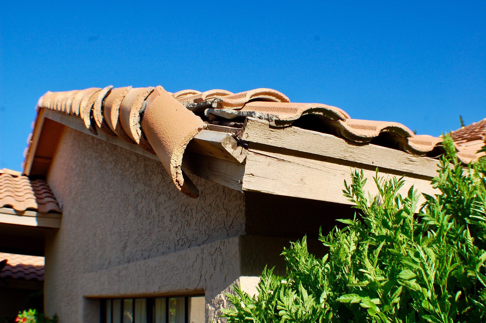 Damage to roof on house from storm